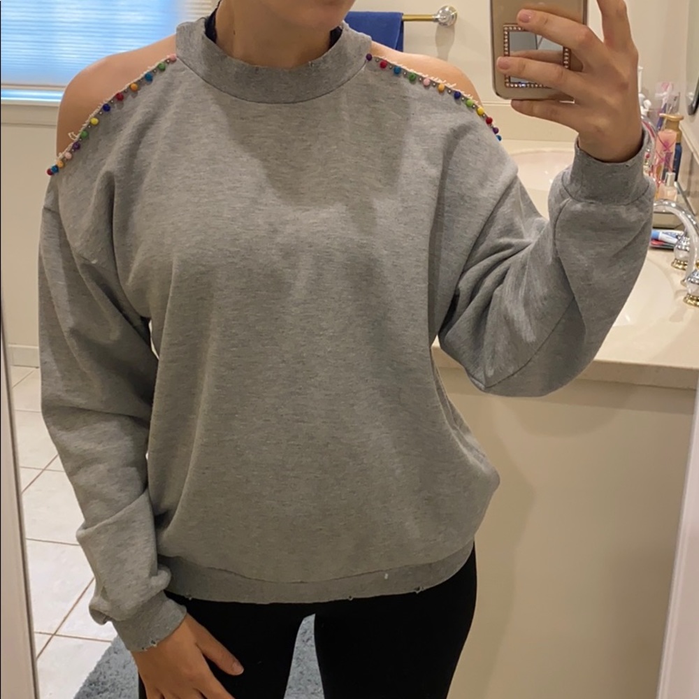 Honey punch cold shoulder Pom Pom pull over
